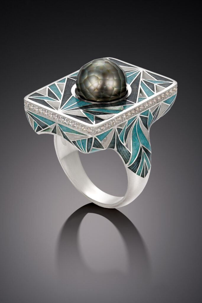 Champleve enamel ring in sterling silver featuring a rare Tahitian Faceted South Sea pearl and white sapphires nestled among bold Art Deco patterns